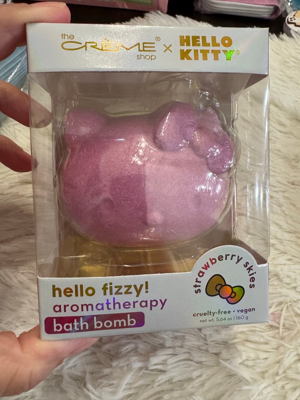 Hello Kitty bath bomb in strawberry skies flavor. Pink glittery aromatherapy